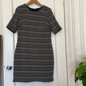Black, white and tan body con dress. Well constructed.